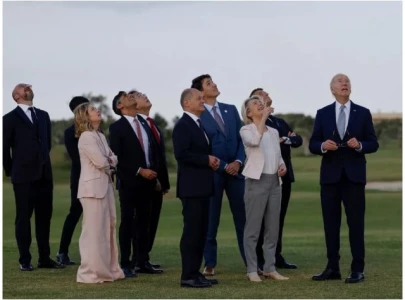 italian pm giorgia meloni redirects president biden during g7 skydiving display