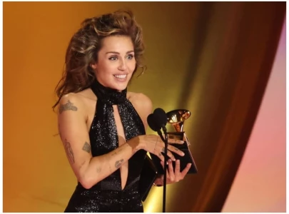 miley cyrus works out in heels to honor marilyn monroe