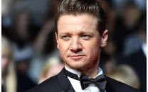 jeremy renner denies allegations of sending explicit messages and threatening to call immigration