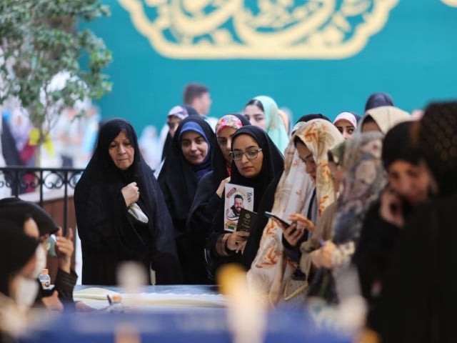 iranian women queue to vote at a polling station in a snap presidential election to choose a successor to ebrahim raisi following his death in a helicopter crash in tehran iran june 28 2024 majid asgaripour wana west asia news agency photo via reuters