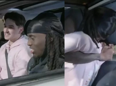 kai cenat challenges a car jitsu champion in a thrilling match on live stream