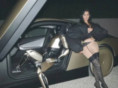 kim kardashian s tesla bot gift from elon musk has everyone asking did she vote for trump