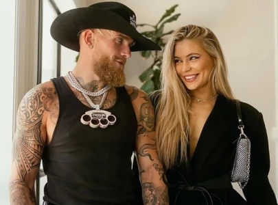 jake paul and jutta leerdam draw attention in abu dhabi during formula 1 grand prix visit