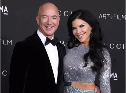 jeff bezos and fianc e lauren s nchez celebrate her son s graduation