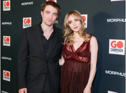 suki waterhouse and robert pattinson s baby loves cookbooks as bedtime story