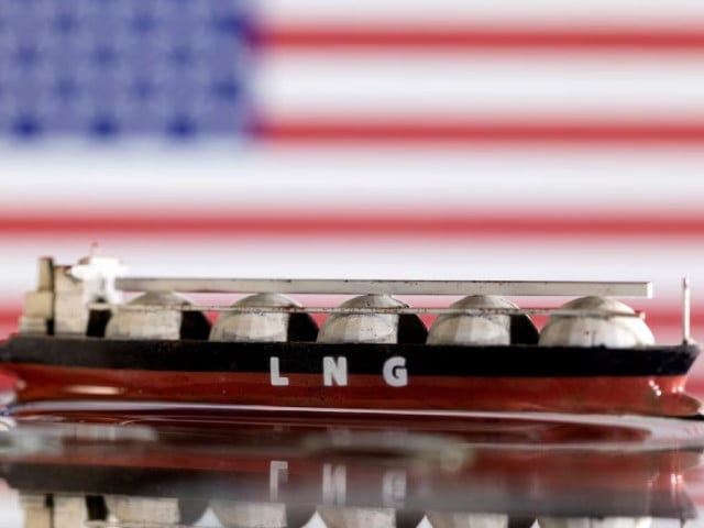 model of lng tanker is seen in front of the u s flag in this illustration taken may 19 2022 photo reuters