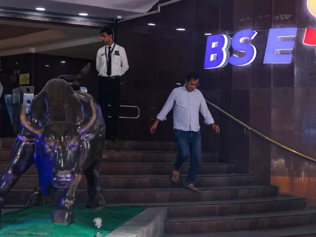 a man walks past the new logo of the bombay stock exchange bse building in mumbai india july 12 2023 photo reuters a man walks past the new logo of the bombay stock exchange bse building in mumbai india july 12 2023 photo reuters