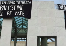 pro palestinian protesters climb onto roof of australia s parliament pro palestinian protesters climb onto roof of australia s parliament