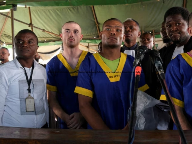 benjamin zalman polun marcel malanga and taylor thompson american citizens suspected along with a group of over fifty other people to be involved in an attempted coup in congo wait for the beginning of their trial in kinshasa democratic republic of congo june 7 2024 photo reuters