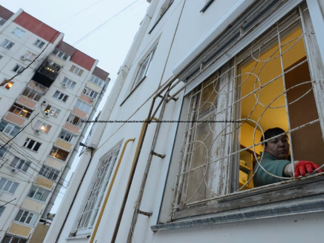 a woman removes broken glass next to a damaged multi storey apartment block following a reported drone attack in voronezh russia january 16 2024 photo reuters a woman removes broken glass next to a damaged multi storey apartment block following a reported drone attack in voronezh russia january 16 2024 photo reuters