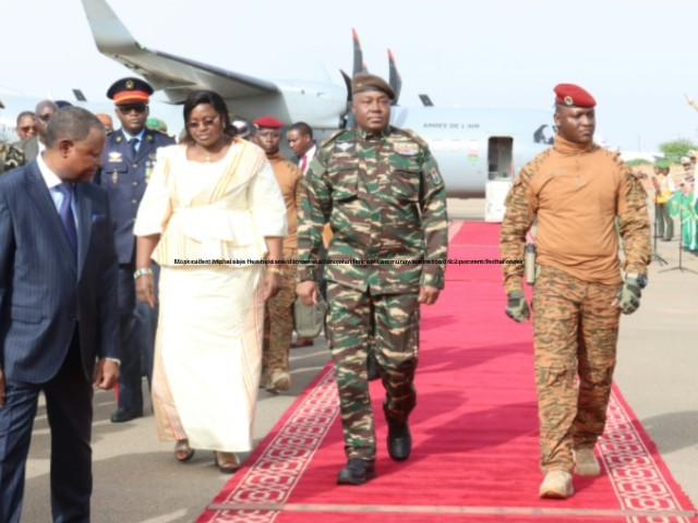 niger s general abdourahamane tiani c pictured with his burkinabe counterpart captain ibrahim traore r is calling for the establishment of a community far removed from the stranglehold of foreign powers   photo afp