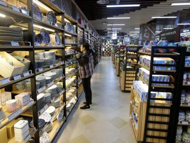 a woman selects a bowl at a supermarket in beijing china december 14 2018 photoi reuters a woman selects a bowl at a supermarket in beijing china december 14 2018 photoi reuters
