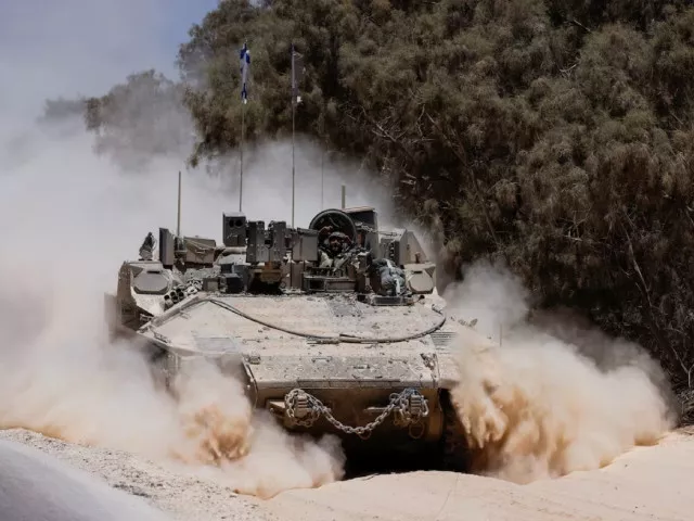 an israeli military vehicle manoeuvres near the israel gaza border amid the israel hamas conflict in israel july 10 2024 photo reuters an israeli military vehicle manoeuvres near the israel gaza border amid the israel hamas conflict in israel july 10 2024 photo reuters