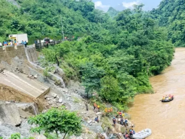 nepal landslides sweep two buses into river 65 passengers missing nepal landslides sweep two buses into river 65 passengers missing