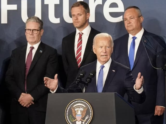 prime minister sir keir starmer left looks on as us president joe biden speaks where he introduced ukrainian president volodymyr zelenskiy as president putin during the closing ceremony at the nato 75th anniversary summit at the walter e washington convention center in washington dc us photo reuter prime minister sir keir starmer left looks on as us president joe biden speaks where he introduced ukrainian president volodymyr zelenskiy as president putin during the closing ceremony at the nato 75th anniversary summit at the walter e washington convention center in washington dc us photo reuter