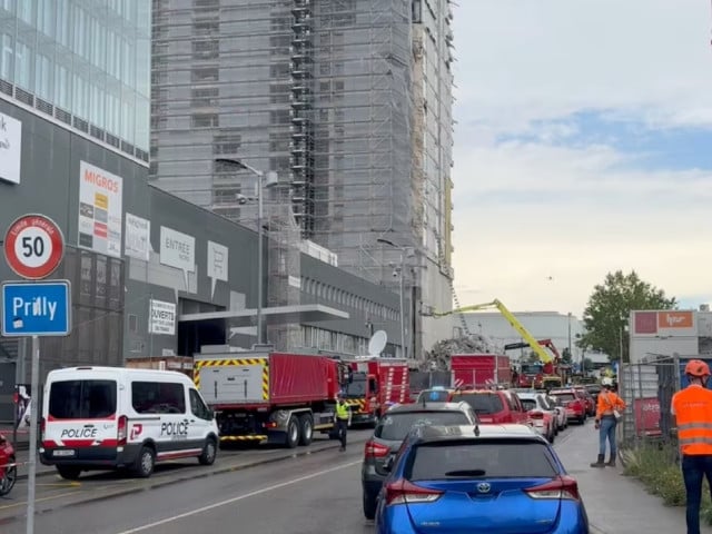 emergency crews work at the site of building folllowing scaffolding incident in prilly switzerland july 12 2024 in this screen grab taken from a video raphael jotterand photo via reuters