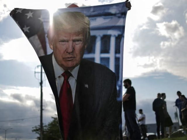 supporters of donald trump wait for his arrival in milwaukee wisconsin a day after he survived an assassination attempt at a rally in butler pennsylvania photo reuters supporters of donald trump wait for his arrival in milwaukee wisconsin a day after he survived an assassination attempt at a rally in butler pennsylvania photo reuters