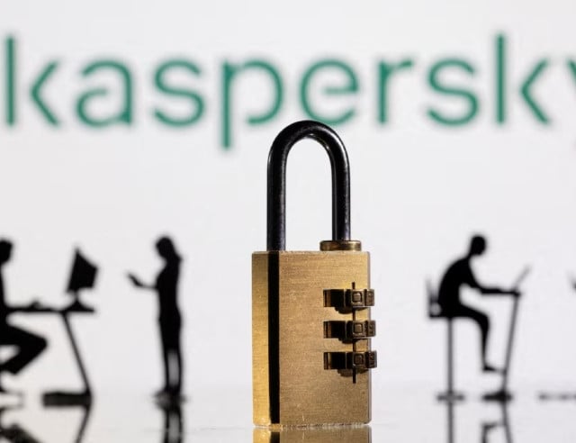 3d printed models of people working on computers and padlock are seen in front of a displayed kaspersky logo in this picture illustration taken february 1 2022 photo reuters