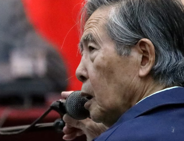 former president of peru alberto fujimori attends a trial as a witness at the navy base in callao peru march 15 2018 picture taken through a window photo reuters