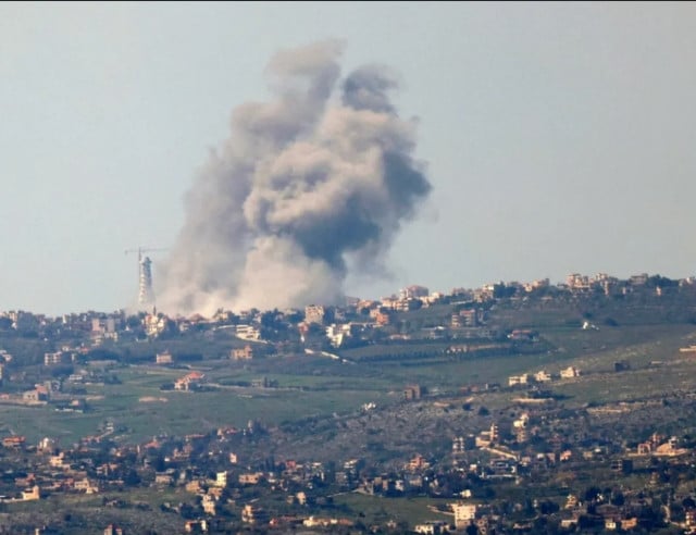 smoke billowing above the lebanese village of bint jbeil during israeli bombardment photo afp