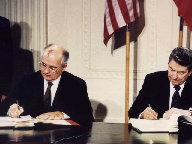 file photo of u s president ronald reagan r and soviet president mikhail gorbachev signing the intermediate range nuclear forces inf treaty at the white house on december 8 1987 photo reuters