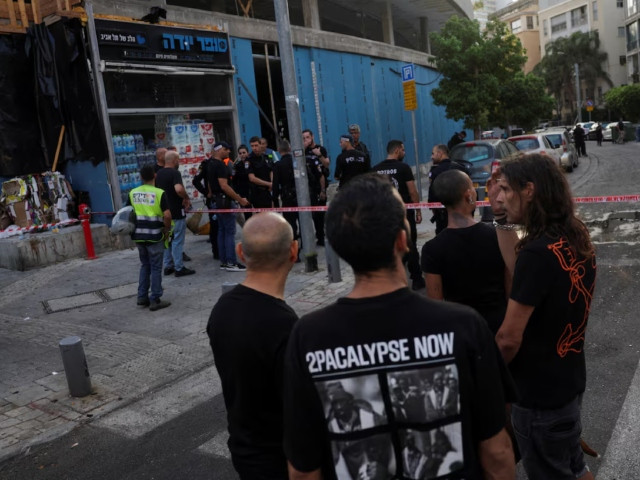 israelis gather at the site of an explosion amid the israel hamas conflict in tel aviv israel july 19 2024 photo reuters israelis gather at the site of an explosion amid the israel hamas conflict in tel aviv israel july 19 2024 photo reuters