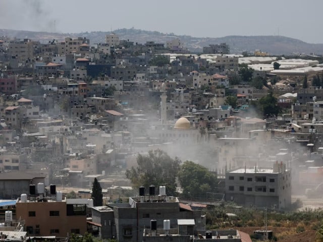 dust is seen as an israeli army bulldozer operates during an israeli raid in nour shams camp in tulkarm in the israeli occupied west bank july 9 2024 photo reuters