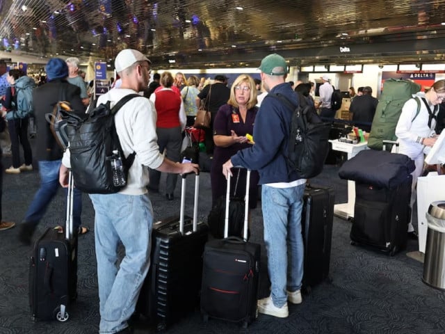 travelers crowd the milwaukee general mitchell international airport after united airlines and other airlines grounded flights due to a worldwide tech outage caused by an update to crowdstrike s falcon sensor software which crashed microsoft windows systems in milwaukee wisconsin us photo reuter