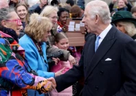 britain s king charles and queen camilla greet people after attending the easter matins service at st george s chapel windsor castle britain march 31 2024 photo reuters
