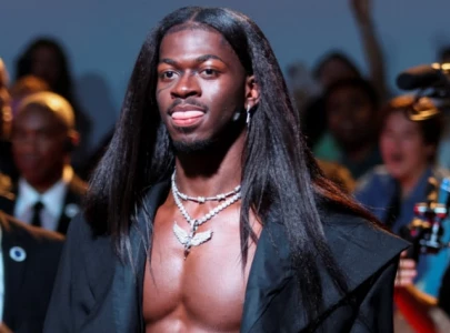 lil nas x hits back at trolls mocking him for flying commercial