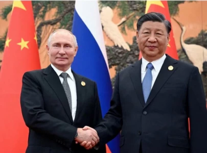 defying west russia s putin set to meet xi jinping in beijing defying west russia s putin set to meet xi jinping in beijing