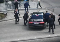 security officers move slovak pm robert fico in a car after a shooting incident after a slovak government meeting in handlova slovakia may 15 photo reuters