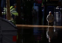 a man walks along a flooded street in the center of porto alegre rio grande do sul brazil may 15 2024 photo reuters
