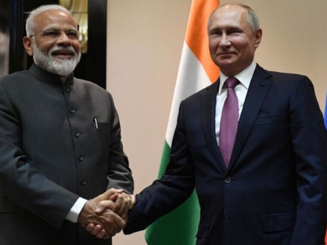 russian president vladimir putin shakes hands with indian prime minister narendra modi before their meeting on the sidelines of the shanghai cooperation organisation sco summit in bishkek kyrgyzstan june 13 2019 sputnik grigory sysoyev kremlin via photo reuters