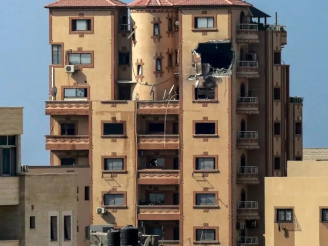 a gaping hole is shown on november 3 2023 in the hajji building which houses agence france presse afp news bureau in gaza city amid the ongoing battles between israel and the palestinian group hamas bashar photo afp a gaping hole is shown on november 3 2023 in the hajji building which houses agence france presse afp news bureau in gaza city amid the ongoing battles between israel and the palestinian group hamas bashar photo afp