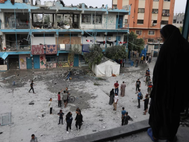 palestinians inspect the site of an israeli strike on a unrwa school sheltering displaced people amid the israel hamas conflict in nuseirat refugee camp in the central gaza strip june 6 2024 photo reuters palestinians inspect the site of an israeli strike on a unrwa school sheltering displaced people amid the israel hamas conflict in nuseirat refugee camp in the central gaza strip june 6 2024 photo reuters