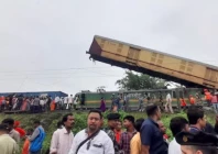 rescue workers along with people gather at the site of a train collision following the accident in darjeeling district in west bengal state india june 17 2024 photo reuters