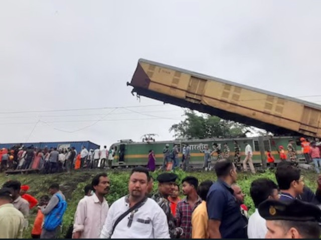 rescue workers along with people gather at the site of a train collision following the accident in darjeeling district in west bengal state india june 17 2024 photo reuters