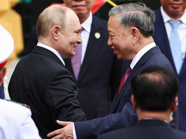 vietnam s president to lam welcomes russia s president vladimir putin at the presidential palace in hanoi vietnam june 20 2024 photo reuters