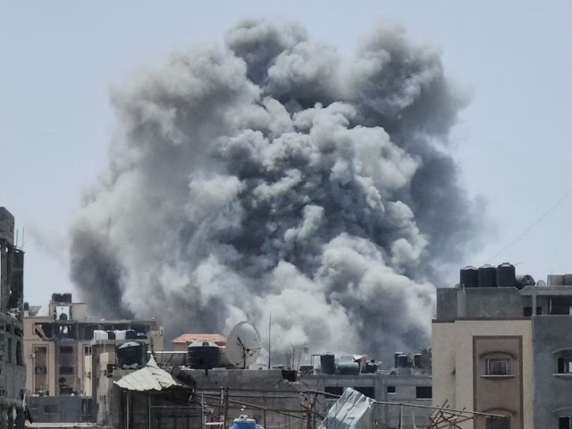 smoke rises following an israeli strike in jabalia refugee camp in the northern gaza strip may 18 2024 photo reuters