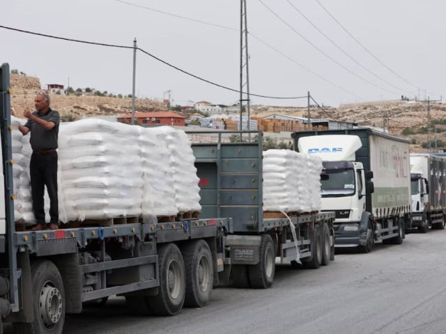 commercial food trucks are seen near a checkpoint near hebron amid the ongoing conflict in gaza between israel and the palestinian islamist group hamas in the israeli occupied west bank may 28 2024 photo reuters