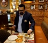 amit bagga ceo of daryaganj restaurant shows a freshly prepared butter chicken dish and the lentil dish dal makhani inside daryaganj restaurant at a mall in noida india january 23 2024 photo reuters