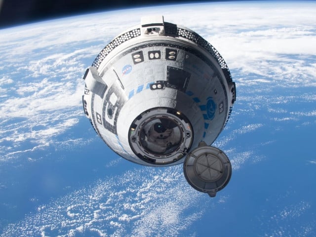 the starliner approaches the international space station during a 2022 test flight the orbiting lab was flying 268 miles above the south pacific at the time of this photograph credit nasa photo astronomy