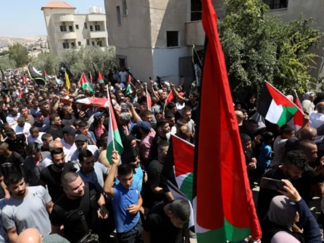 palestinian mourners carry the body of othman abu khuroj 17 in the occupied west bank town of zababdeh on august 22 2023 photo al jazeera