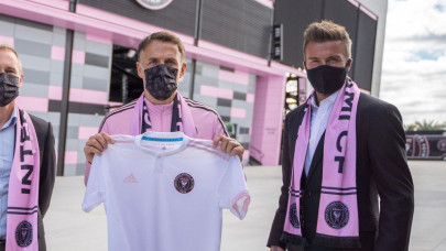 beckham defends hiring pal neville