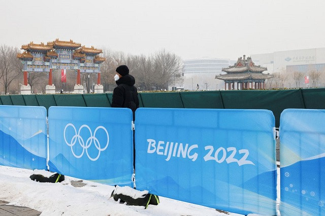 a security guard stands near the closed loop bubble at the main press center ahead of the beijing 2022 winter olympics in beijing china january 23 2022 photo reuters