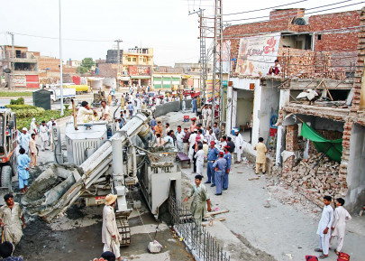 fenced in shopkeepers to move court to stop bhatta chowk wall fenced in shopkeepers to move court to stop bhatta chowk wall