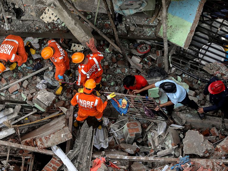 India building collapse death toll climbs to 20, second day search underway