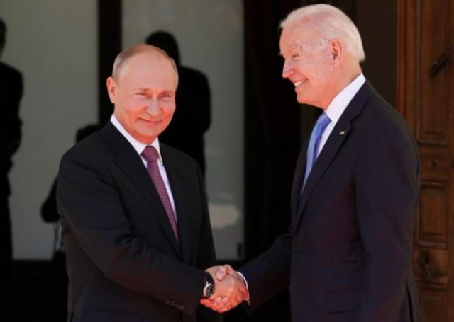 us president joe biden and russia s president vladimir putin shake hands as they arrive for the us russia summit at villa la grange in geneva switzerland june 16 2021 photos reuters