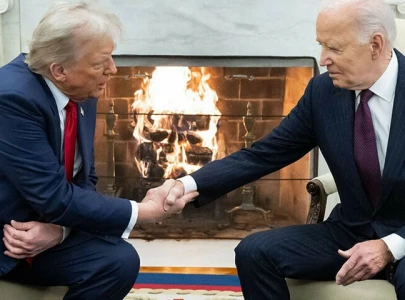 trump biden shake hands in white house